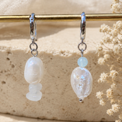 Asymmetrische Ohrringe mit echtem Rosenquarz & Süßwasserperlen. Handgefertigt, einzigartig & zeitlos elegant. Jetzt entdecken bei BE-Youniq.
