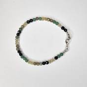 Handgefertigtes Edelsteinarmband Golden Aura mit Citrin, Aventurin, Labradorit und Onyx – elegantes Edelstein Armband für Damen, das Stärke, Balance und positive Energie vereint.