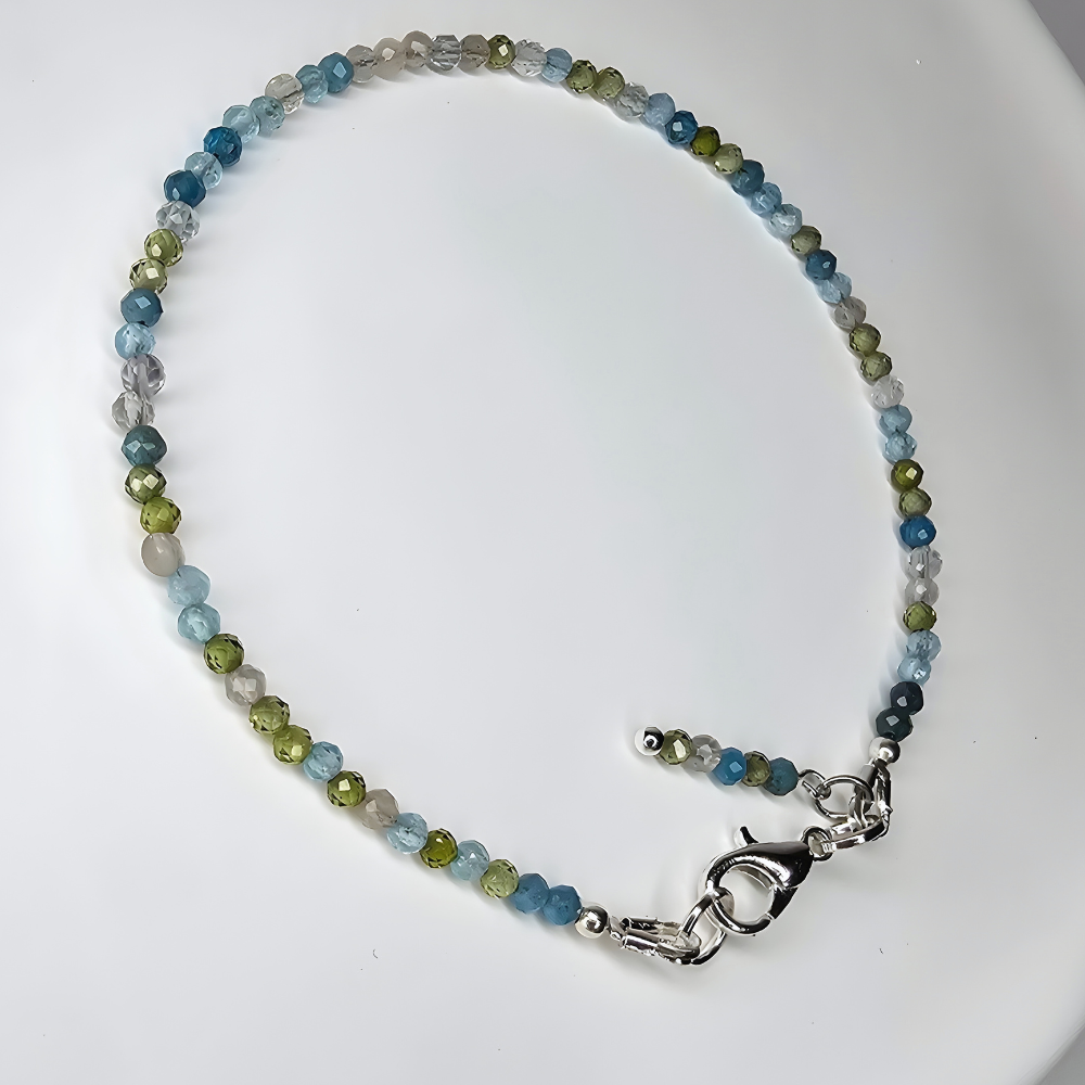Handgefertigtes Edelsteinarmband mit Peridot, Apatit, Topas, Fluorit und Mondstein