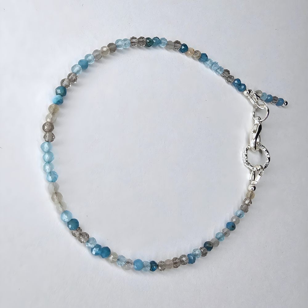 Feines Edelsteinarmband mit Apatit, Rauchquarz, Topas und Mondstein