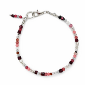 Granat Armband mit Mondstein als Geburtsstein für Januar sowie Howlit, Hämatit und Rhodonit. Warm, stabilisierend und elegant – ein starker Begleiter im Alltag.