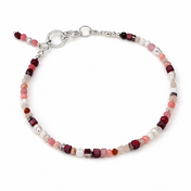 Handgefertigtes Edelsteinarmband mit Granat, Mondstein, Howlit, Hämatit, Bambuskorall, rotem Sandstein, Rhodonit und Süßwasserperlen.